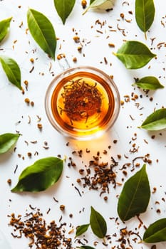 Tea leaves and cup of tea on white background. Generative AI.