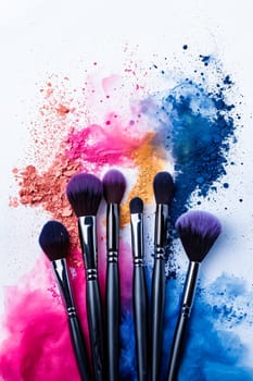 Makeup brushes on white background with colorful powder. Generative AI.