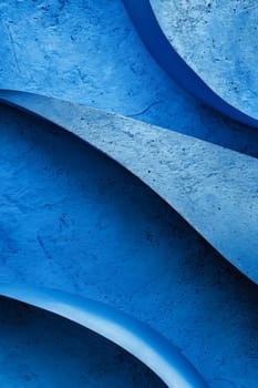 Blue wall with wavy lines. Generative AI.