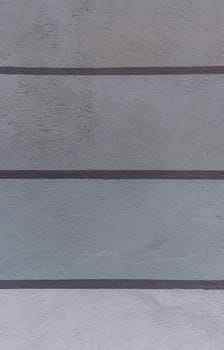 striped wall painted gray as texture and background
