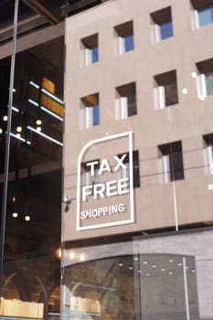 shop tax free text duty free shop sign on shop window ,