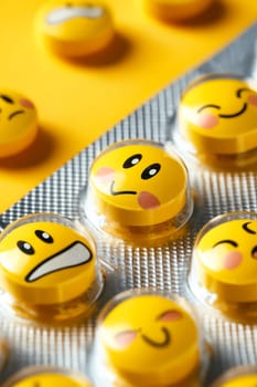 A group of yellow pills with faces on them. Scene is lighthearted and playful. Generative AI
