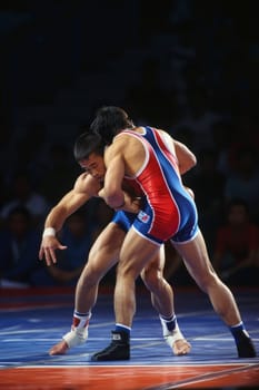 Two male wrestlers in a gripping contest, showcasing strength and skill in a crowded arena