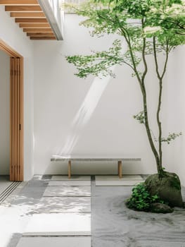 A tree is growing in the courtyard next to a bench, adding a natural touch to the propertys landscaping with its bonsailike appearance