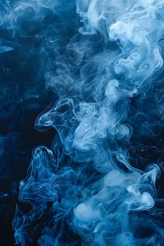 A close up shot of electric blue smoke swirling on a dark background, resembling waves in the sky. The fluid and gas mixture creates a mesmerizing pattern in the darkness