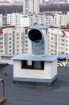 The white house has a composite material roof with a chimney and stairs. The urban design includes wooden walls and windows, enhancing the propertys aesthetic appeal