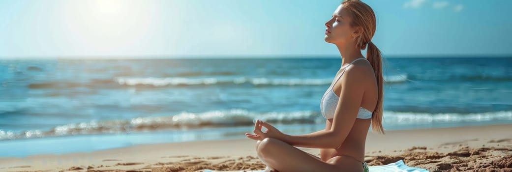 Young beautiful woman wear a two-piece sitting on a blanket on the sand meditating, on the beach