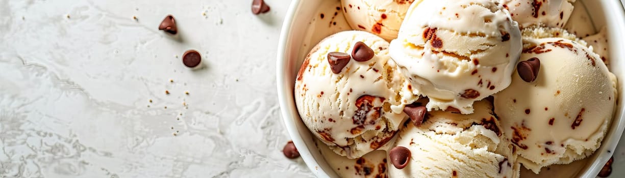 Homemade creamy ice cream with chocolate chip cookie pieces in an ice cream bowl. Banner with place for text. AI generated.