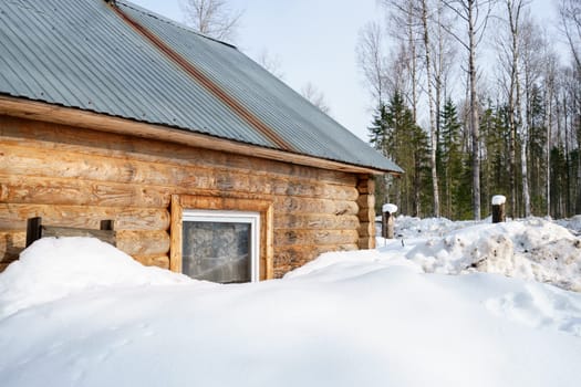 Image of forester house covered with snow in forest