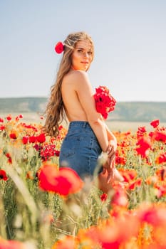 Woman poppies field. portrait of a happy woman with long hair in a poppy field and enjoying the beauty of nature in a warm summer day