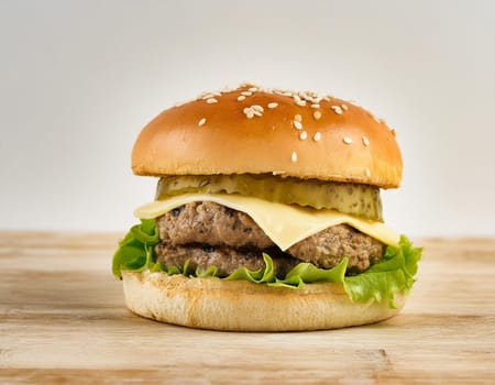 Grilled masterpiece: Juicy hamburger with fresh ingredients