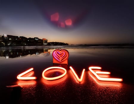 Word “Love” as neon lights on a Bridge