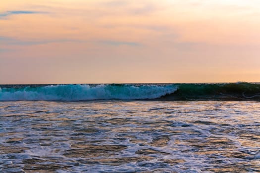 Beautiful sunny landscape panorama with huge powerful waves and clear water in Bentota Beach Galle District Southern Province Sri Lanka island.