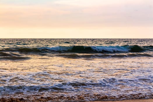 Beautiful sunny landscape panorama with huge powerful waves and clear water in Bentota Beach Galle District Southern Province Sri Lanka island.