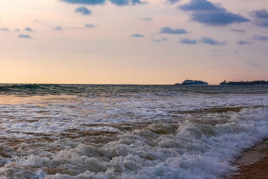 Beautiful sunny landscape panorama with huge powerful waves and clear water in Bentota Beach Galle District Southern Province Sri Lanka island.