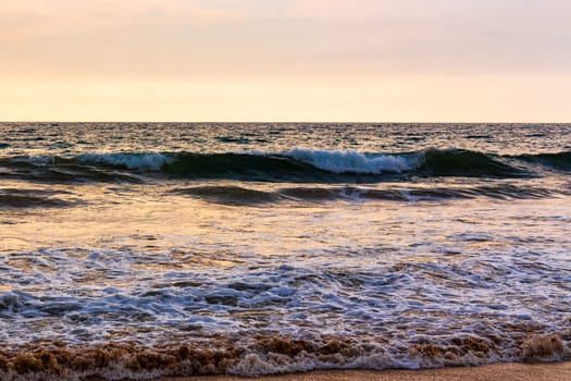 Beautiful sunny landscape panorama with huge powerful waves and clear water in Bentota Beach Galle District Southern Province Sri Lanka island.