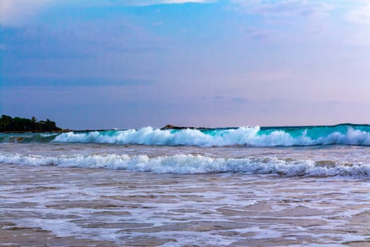 Beautiful sunny landscape panorama with huge powerful waves and clear water in Bentota Beach Galle District Southern Province Sri Lanka island.