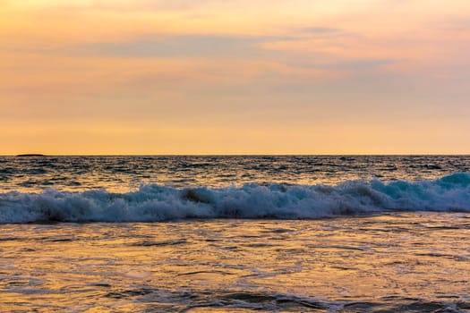 Beautiful sunny landscape panorama with huge powerful waves and clear water in Bentota Beach Galle District Southern Province Sri Lanka island.