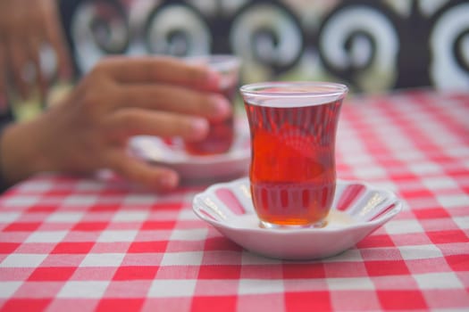 Traditional turkish tea on white table