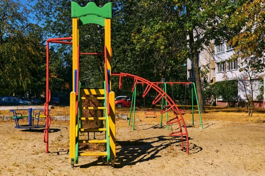 an outdoor area provided for children to play in, especially at a school or public park