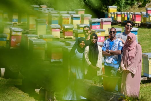 A diverse group of young friends and entrepreneurs explore small honey production businesses in the natural setting of the countryside