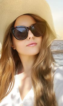 Beauty, summer holiday and fashion, face portrait of happy woman wearing hat and sunglasses by the sea, for sunscreen spf cosmetics and beach lifestyle look idea