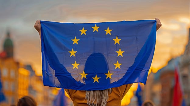 A person holding a flag featuring the European Union symbol