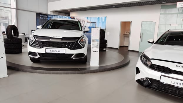 Cheboksary, Russia - March 20, 2023: Cars in showroom of dealership KIA