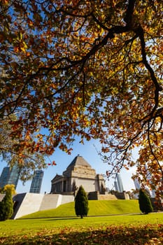 The Shrine of Remembrance and surrounding parklands and gardens during autumn at the Royal Botanic Gardens Victoria in melbourne, Victoria, Australia