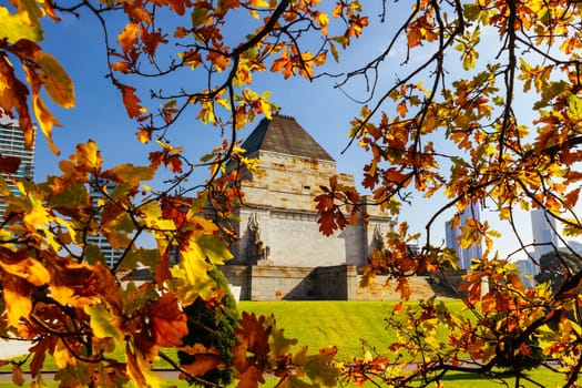 The Shrine of Remembrance and surrounding parklands and gardens during autumn at the Royal Botanic Gardens Victoria in melbourne, Victoria, Australia