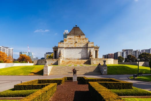 The Shrine of Remembrance and surrounding parklands and gardens during autumn at the Royal Botanic Gardens Victoria in melbourne, Victoria, Australia