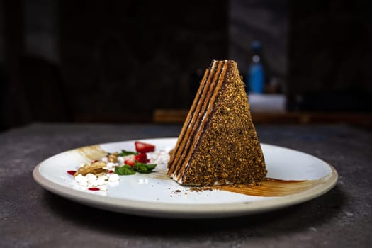 Layered honey cake. beautiful dessert serving in a cafe.