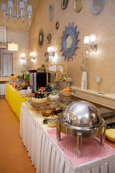 Buffet table in the hotel with various dishes.