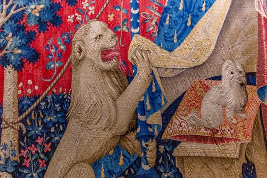 PARIS, FRANCE, DECEMBER 16, 2023 : The lady and the unicorn, renaissance tapestry, Cluny chapel, Paris, France