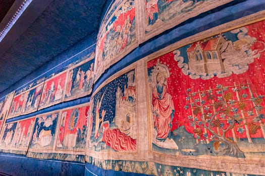 ANGERS, FRANCE, MARCH 23, 2024 : Apocalypse medieval tapestry, by Jean Bandol and Nicholas Bataille, 14 th century, Angers castle, france