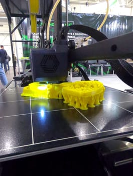 3D printer. 3D printing. 3d printer printing process close-up. 3D printer creating object from molten plastic. Modern three-dimensional printing technologies. Innovation additive robotic technology