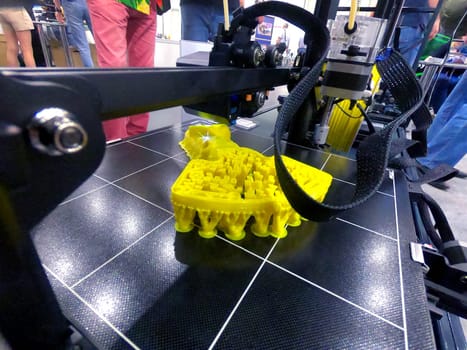 3D printer. 3D printing. 3d printer printing process close-up. 3D printer creating object from molten plastic. Modern three-dimensional printing technologies. Innovation additive robotic technology