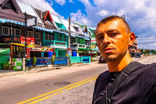 Man takes photo selfie in the city in Pattaya Bang Lamung Amphoe Chon Buri Thailand in Southeastasia Asia.