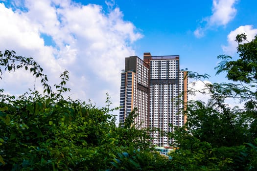 Highrise buildings skyscrapers building skyscraper town city cityscape streets in Pattaya Bang Lamung Amphoe Chon Buri Thailand in Southeastasia Asia.