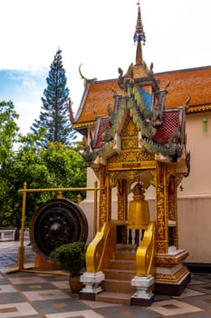 Gong and bell bells at golden gold Wat Phra That Doi Suthep temple temples building in Chiang Mai Amphoe Mueang Chiang Mai Thailand in Southeastasia Asia.