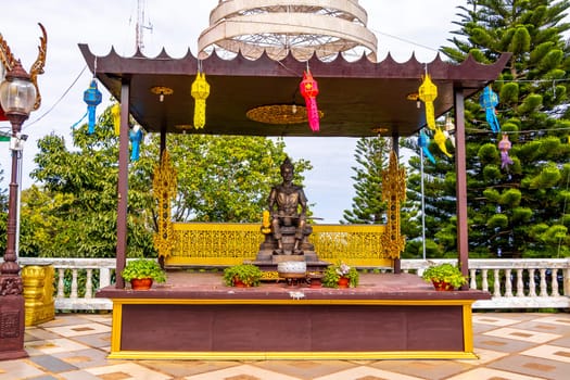 Buddha sculture figure statue at golden gold Wat Phra That Doi Suthep temple temples building in Chiang Mai Amphoe Mueang Chiang Mai Thailand in Southeastasia Asia.