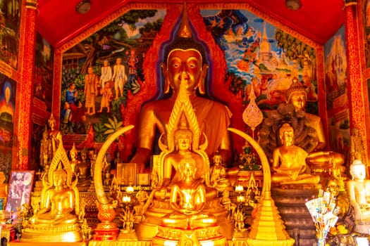 Buddha sculture figure statue at golden gold Wat Phra That Doi Suthep temple temples building in Chiang Mai Amphoe Mueang Chiang Mai Thailand in Southeastasia Asia.