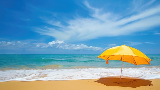 A vibrant beach umbrella provides shade on the sandy shore overlooking the sparkling ocean, with people enjoying the coastal natural landscape under a clear sky AIG50