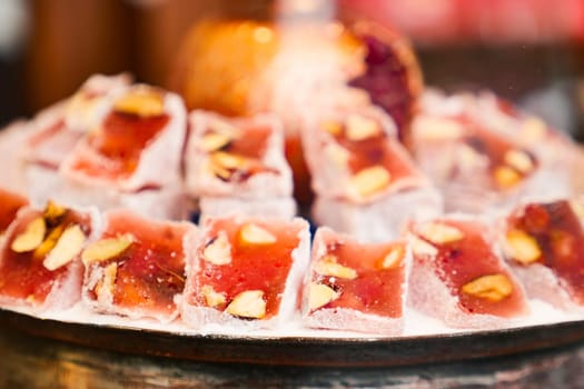 turkish delight or lokum of red on a bowl .