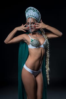 Image of sexy go-go dancer posing in erotic costume