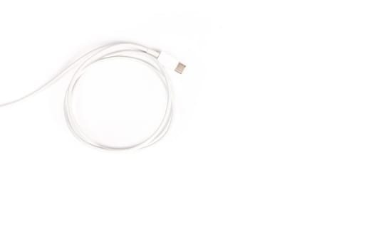 White USB-C cable isolated on white background, copy space. High quality photo