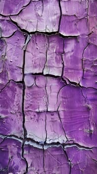 A vibrant purple surface shows a complex network of cracks and chips. The texture highlights the beauty of decay and the passage of time