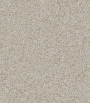 The extruded fiber is light brown in color.Texture or background.
