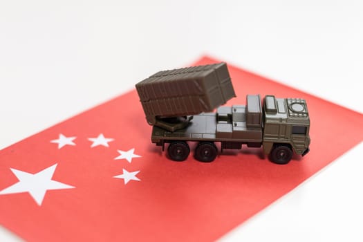 military equipment as tank with flag of China on white background. Countries' military forces topic. High quality photo