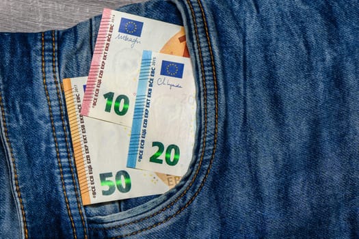 Concept of financial problems, last money. 50 euro banknote in jeans pocket. 2